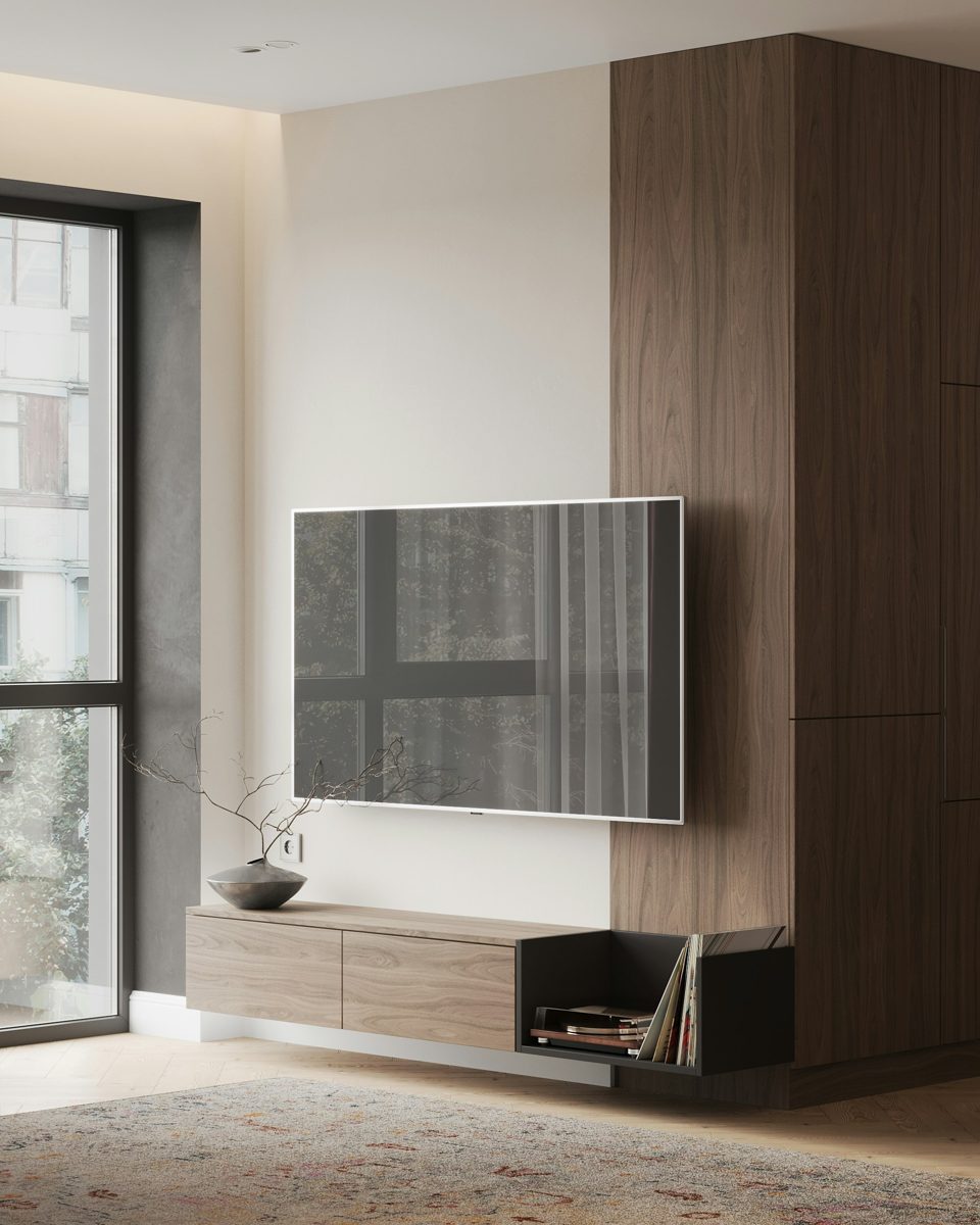Televisor integrado a una pared de madera con mueble flotante